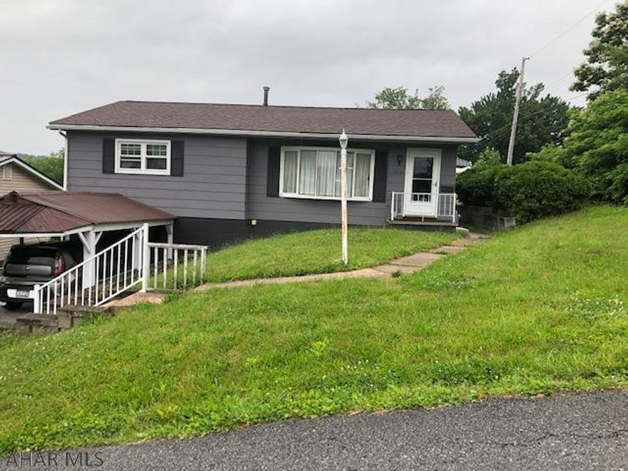 Raised Ranch in a Great Neighborhood with 2 full baths upstairs, new windows, newly painted exterior, oak kitchen, central air and hardwood floors, carport and fenced yard. There is a finished basement with a bonus room that was used as a bedroom and also a 1/2 bath in basement.Main floor has a handicap 3/4 Bath and also here is a stairlift that is negotiable going to the basement.