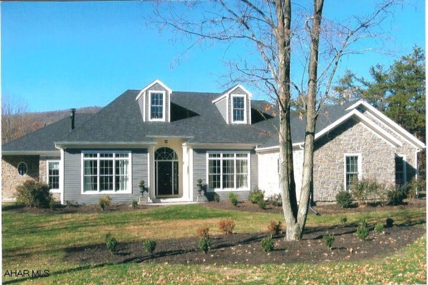 Too lovely to describe Ranch style custom home on 2+/- acres. Pella windows, crown molding, tray ceilings, walnut hardwood floors, chandeliers. All new kitchen appliances, stainless steel with farmhouse style sink, marble countertops, 3 fireplaces, two are wood, one gas. 3 zoned hot water baseboard heat w/central air. Lots of custom touches. Two car attached garage. lovely rear screen porch w/fireplace leads to trex deck, underneath stamped concrete patio with hot tub.