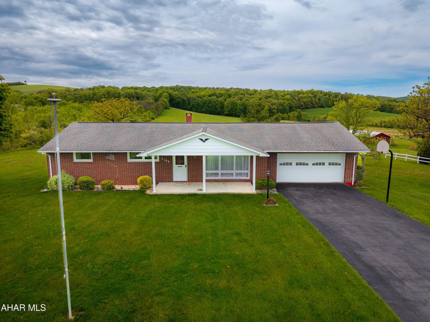 Welcome to this solid 3 bedroom, 1.5 bath brick ranch home located in the quiet town of Alum Bank, within the Chestnut Ridge School District. Set in a country-style setting yet conveniently in town, this home offers the best of both worlds. Inside, you'll find hardwood floors under the existing carpet, ready to be uncovered and brought back to life. The main level offers a comfortable layout with plenty of natural light, and the attached garage adds both convenience and extra storage space.

Step outside to enjoy a private backyard—ideal for gardening, relaxing, or hosting get-togethers. Whether you're looking for your first home, downsizing, or investing in a property with long-term potential, this one has a lot to offer. With a little updating, it could shine even brighter.

Don't miss the opportunity to make this Alum Bank gem your own!