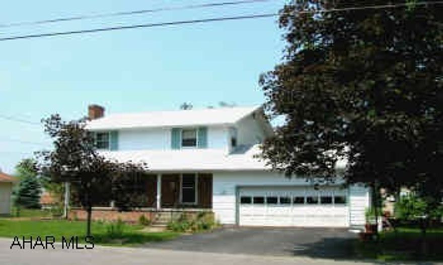 Attractive two story on large lot in the borough, 3 bedrooms, fireplace, new furnace, hardwood floors, and much more.