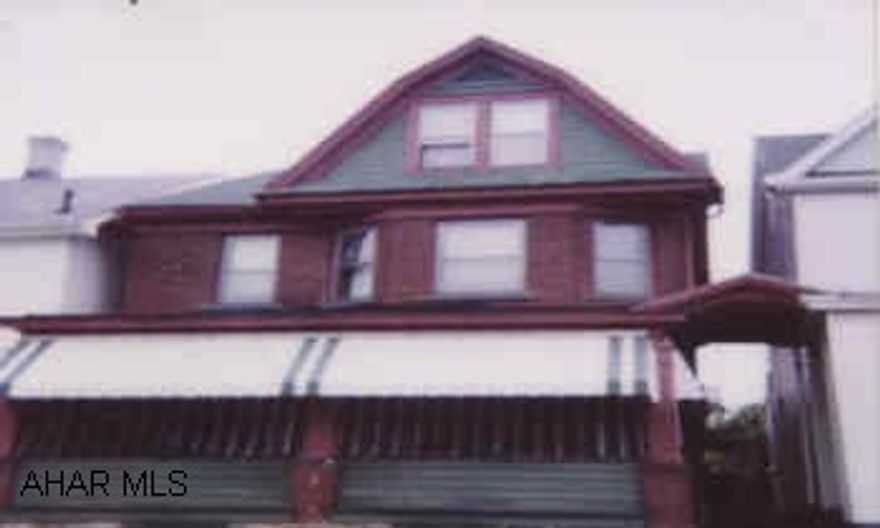 2 STORY BRICK, 3 BEDROOMS, 1.5 BATH. 26X120 LOT PLUS 40X50 ADJOINING LOT. 2 CAR GARAGE. PRICED TO SELL BELOW APPRAISED VALUE. TO BE SOLD "AS IS".