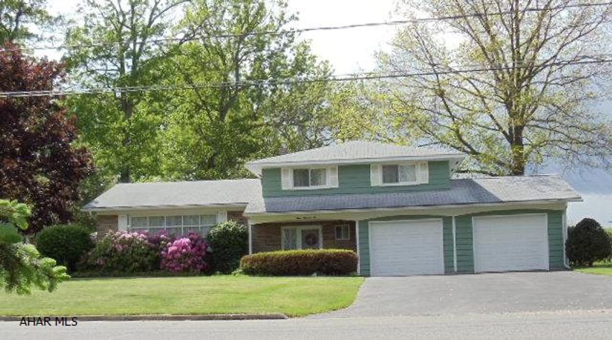 Beautiful Location!  3 bedroom, 1 1/2 bath home, modern kitchen w/island + breakfast room w/2 bow windows, formal dining room, rec room, family room w/fireplace, office covered back patio, central air, & 2-car garage.  #J-134