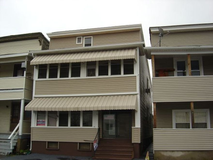 Totally remodeled owner pays heat (new furnace)and water/sewer. Tenants pay electric. New siding, thermo windows, 2 stoves, 2 refrigerators, washer & dryer included.