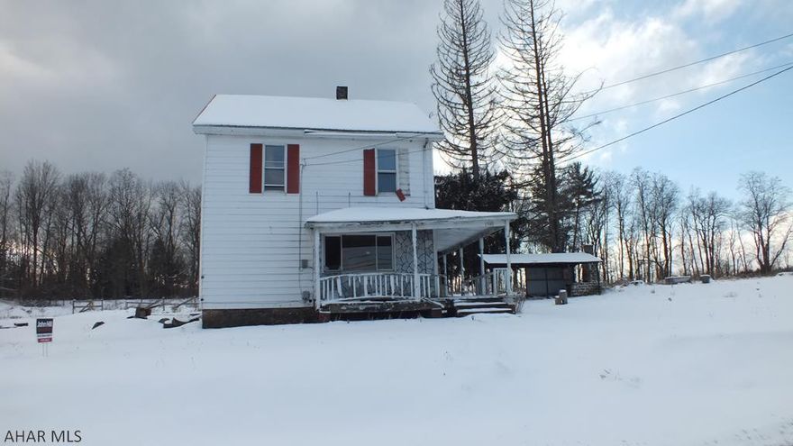 Coalport area farmette on over 34 acres! Needs significant TLC, but amazing grounds and loads of possibilities. Large 2 story house and 2 car detached garage both with metal roof. There is also an old barn on the property that needs work (possible tear down). AS-IS sale. Seller will make no repairs. FRONT PORCH OF HOUSE AND BARN VERY HAZARDOUS - STAY AWAY FROM BOTH.