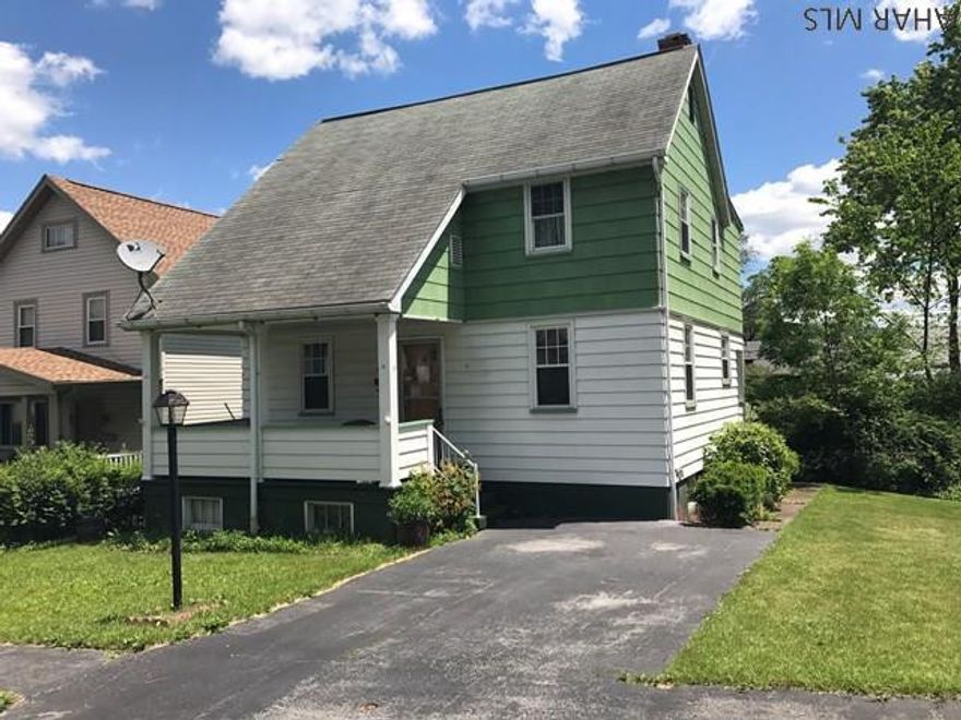 Location! Location! Location! This home sits on a quiet street in Eldorado. Although it need a little TLC the potential is endless. 3 Bedrooms, 1 bath, eat in kitchen, dining room and living room with hardwood floors are just some of the things this home has to offer.