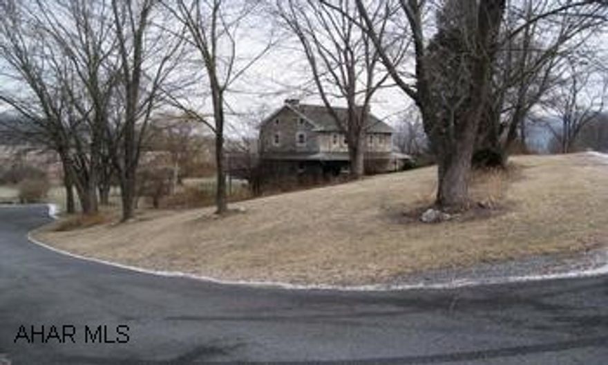 Unique stone home on over 11 acres. Built in 1800, 4 car detached garage, gazabo, hot tub and pond. Unigue stone home on over 11 acres. Many extras including a pond, stream, gazebo, and covered hot tub. Hardwood floors in much of the home, 4 fireplaces (2 with wood burning inserts). LOCATED CLOSE TO HISTORIC BEDFORD, BEDFORD SPRINGS RESORT, LAKES, ROCKY GAP STATE PARK, AND STATE GAME LANDS.