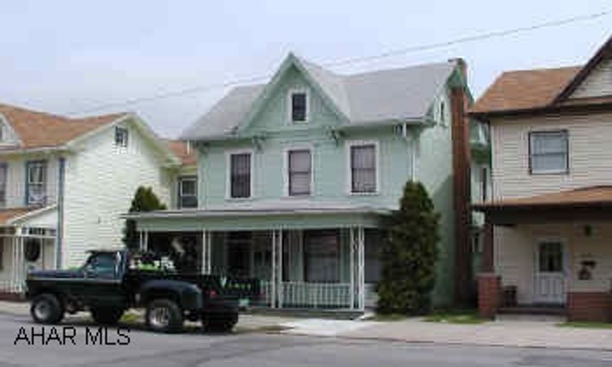 2 large apartments, large 2 car garage.