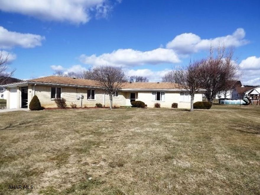 Sprawling brick ranch w/ newer improvements of flooring, carpeting, chimney liner, resurfaced kitchen counters, sink, and disposal. Combo heaters w/ electric baseboard, electric radiant wood burner insert, vaulted and beamed living room and family rooms. Great location, lovely setting.