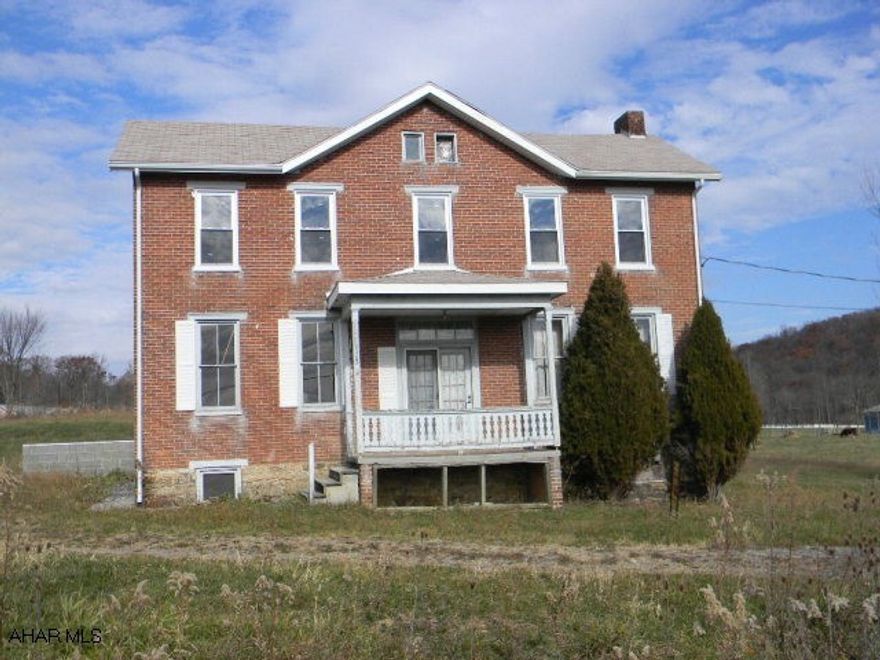 Sturdy brick farmhouse, circa 1910, large bank barn with new roof, on 10+ mostly open acres. House is partially renovated to contain at least 8 rooms, 4 bedrooms, 3 baths and with show-place potential.State Game Lands on Wills Mountain are within walking distance. Sacrifice priced! This is that old farmhouse with acreage seemingly all want!