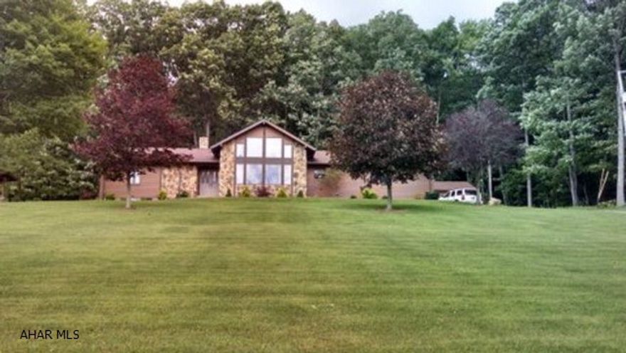 Absolutely stunning quality built home. This 3 bedroom, 2 full and 2 half bath home is a must see! Large rooms, very immaculate and custom features throughout. Sun room is exquisite! Home has an attached 2 car garage as well as a 3 car detached garage. A large workshop within the 3 car garage is fully insulated and heated. Partially finished basement with half bath.