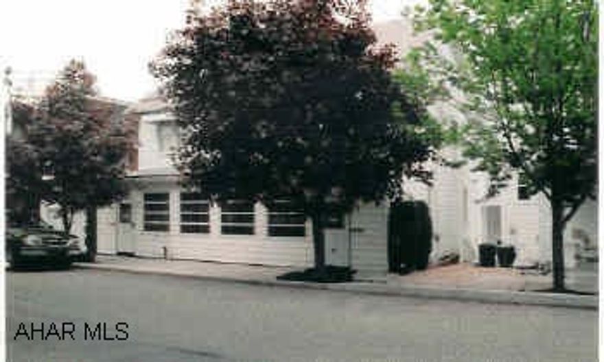 Nice 2 1/2-Story Duplex with hardwood floors & carpeting. Plenty of space, high ceilings, close to shopping  & downtown. Investment or live in property w/ a rental. Attic has additional room for storage or another bedroom. Move-in condition Basement has shower, toilet and washer/dryer included.