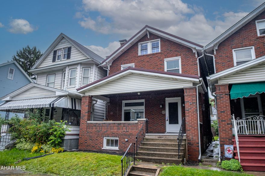 This charming three-bedroom, one-bath brick home offers a classic and inviting appeal. Its sturdy brick exterior suggests durability and timeless character.

As you approach, you're greeted by a large porch, perfect for enjoying a morning coffee or evening breeze. This generous outdoor space provides an ideal spot for relaxation and entertaining.

Inside, the home boasts beautiful hardwood floors throughout, adding warmth and elegance to each room. The layout includes three comfortable bedrooms and a  full bathroom. 

A notable feature of this property is the detached garage, offering convenient parking and additional storage or workshop space, separate from the main residence. This a must see. Schedule a tour.