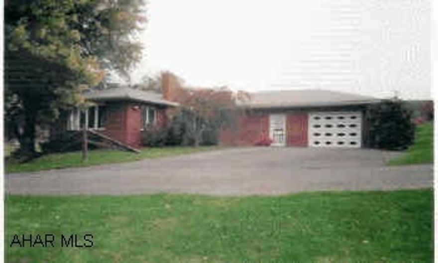 Brick rancher in good location. Very large rooms, brick fireplace, convenient laundry area.