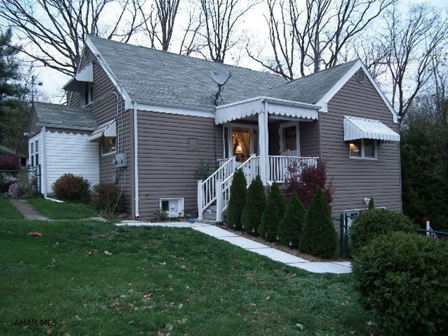 Enjoy this 2 bedroom home with 2nd floor apartment.  Apartment has separate entrance or can be open from 1st floor for 2 Story living.  Updated kitchen with Stainless Steel appliances and eating area with built-in hutch.  Large spacious living room, 2 bedrooms & bath on 1st floor for convenient 1 Story living.  Home is situated on 1.8 acres with great view.  Enjoy summer evenings under Pergola (Wisteria and Clamatis).  Updated windows, siding & new 40 year metal roof installed.  11/6/12.  Water bill is $38-$48 (includes apartment), Gas Budget $51.00/month, Electric $68.86 - $109 (includes running spa and central air), Home owner insurance is $458.00/year.