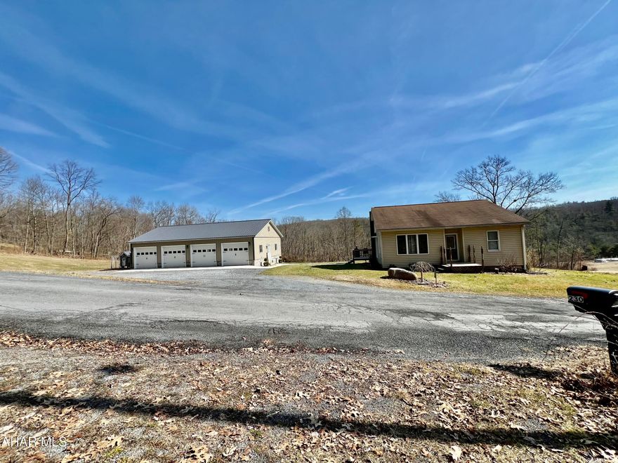 Charming, well maintained inside and out ranch home nestled on 4 acres.  Beautiful view from every angle. This home features new flooring, trim and paint throughout home, updated kitchen and bathroom. 30X50 4-car garage built in 2020.