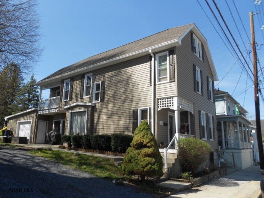 Located in Bedford's Historic District. The woodwork and built-ins thru out this home are beautiful. Pocket doors lead into the large living room with new carpeting, formal dining room has hardwood floors. Updated eat-in kitchen with main level laundry, also main level full bath. New addition has a 18X20 workshop. 2nd floor has 3 bedrooms with a bonus room, small balcony on 2nd floor. Full bath with jacuzzi tub and shower, front and back staircases. Third floor is attic storage or could be 2 additional rooms. Heat is natural gas F/A and central air. This is a lovely home that could also be used for a business , since zoning is C-1 commercial.