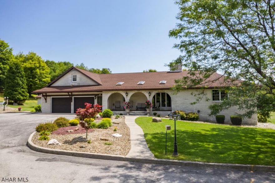 Beautiful custom built home with plenty of upgrades! This home is built for entertaining and has 2 complete kitchens and fireplaces throughout. This is truly a must see! Seller has reconfigured the lot and expects it to be over 2 acres. All custom made kitchen cabinets, tile and real wood flooring throughout home, dining room and front door chandeliers, separate laundry room on first floor, full basement custom bar with sinks, hook-ups for reach-in cooler and ice machine, beautiful open sunroom with skylights, built in garage cabinets, fully carpeted attic with closets and separated rooms, also includes a pull down attic for storage space, pool house garage with cabinets, sink and stove hookups, built-in salt water pool with diving board and walk-in steps, fish pond with waterfall.