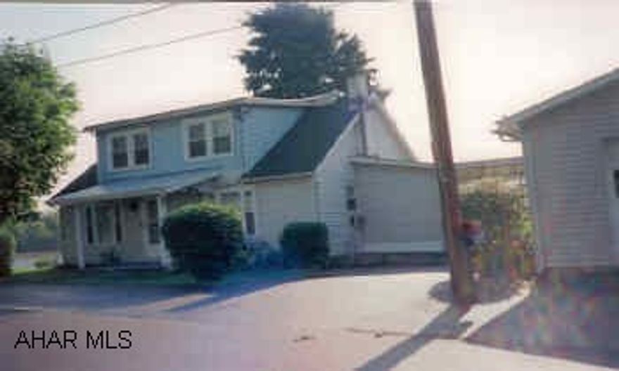 Nice home on double lot, quiet street. Large fenced yard, garden, breezeway, deck, two sheds. First floor laundry. New windows. Includes all appliances and riding mower. Abundance of storage.