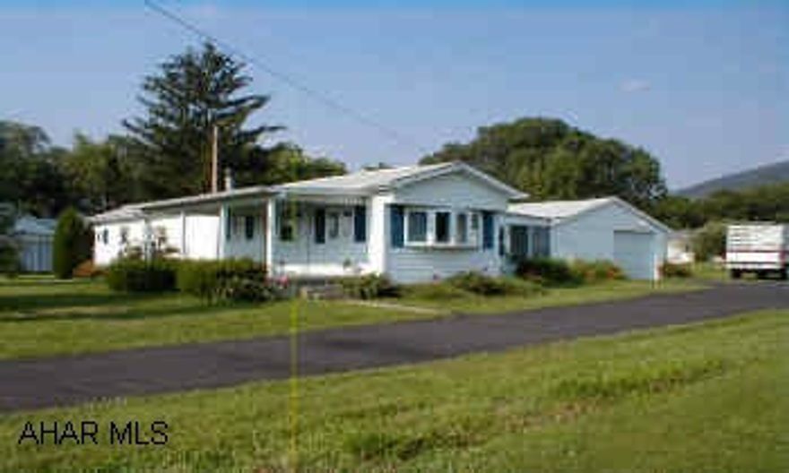 6 years ago installed new vinyl siding, new windows, new shinglesHard wood floors under carpeting, large storage room, front porch, closed porch