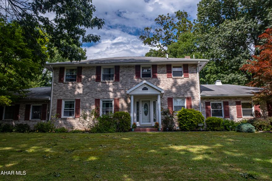 Welcome to 708 Beaumont Drive, Altoona, PA 16602 - a stunning residence that combines spacious living, versatile design, and endless possibilities. Nestled in the desirable Highland Park neighborhood, this 4-bedroom gem offers an incredible canvas for creating the home of your dreams.

Spanning 2800 square feet of above-ground living space, this home features an impressive layout designed to cater to your every need. The unique offering of not one but two primary suite options - one on the main floor and another on the second floor - ensures convenience and flexibility for multi-generational living or guests. With a total of 3 full bathrooms and 2 half bathrooms, your comfort and privacy are prioritized.

Stepping inside, you'll be greeted by a warm ambiance highlighted by gleaming hardwood floors and charming wood ceilings in select rooms. The central kitchen area creates an open-concept living space, perfect for hosting gatherings and creating lasting memories. The formal dining room sets the stage for elegant dinners, while two spacious family rooms on the main floor provide ample space for relaxation and entertainment.

Indulge in the outdoors with the quant screened-in patio, a true oasis that overlooks the back paver patio and an inviting inground pool. The custom-built bar by the pool adds an extra layer of luxury, transforming your leisure time into a resort-like experience. With a large lot, the potential for landscaping and outdoor activities is boundless, making this backyard a true sanctuary for all ages.

The bedrooms are generously proportioned, ensuring everyone has their own haven to retreat to. The living spaces are equally expansive, offering versatility in how you choose to utilize them - from crafting a cozy reading nook to setting up a home office or play area.

Situated in the desirable Highland Park neighborhood, this home also features a two-car garage, ensuring convenience for parking and storage. The location provides easy access to local amenities, schools, and parks, making it an ideal place to call home.

Though this home boasts great bones and a functional layout, there's ample opportunity to infuse your personal touch and style with just a little TLC. Whether you're envisioning modern updates, personalized finishes, or creative design elements, this property is ready to be transformed into your very own masterpiece.

In summary, 708 Beaumont Drive presents an exceptional opportunity to acquire a spacious, well-located home with remarkable potential. With its dual primary suites, multiple living areas, outdoor retreats, and room for customization, this residence truly offers the best of both worlds - a solid foundation and the chance to create a living space that resonates with your unique vision. Don't miss out on this chance to shape your future - schedule your showing today and imagine the possibilities that await!