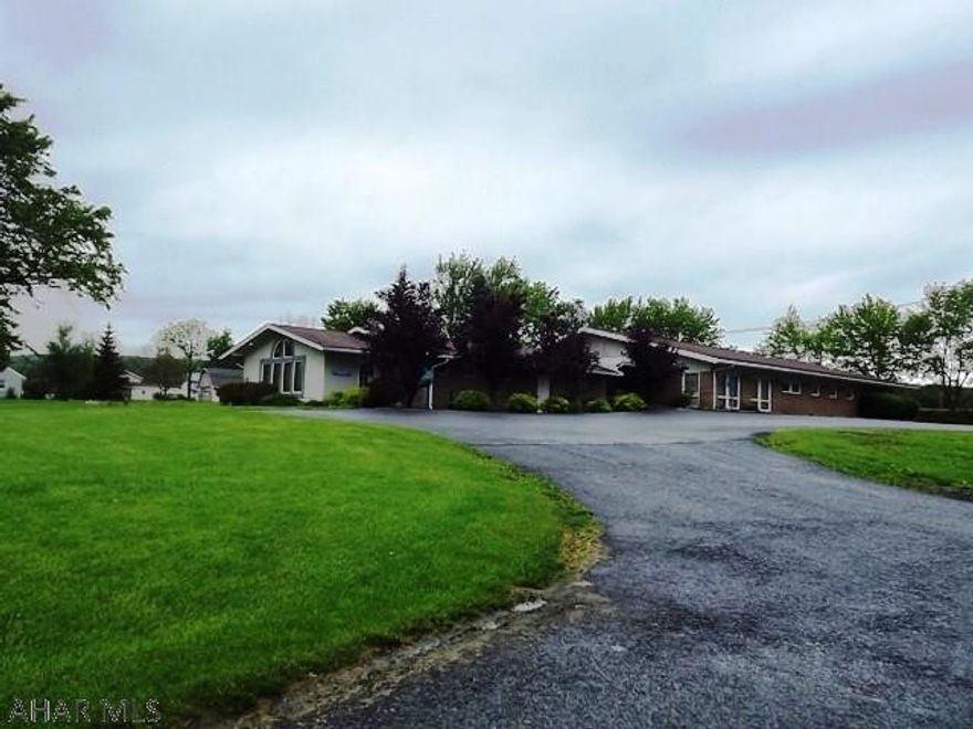 Brick 6700 sqft commercial building with a full basement and on 1.34 acres. Three medical offices (1 currently leased) which include exam rooms, nurses station, office, kitchen, bath and handicap accessible. Located 35 minutes from Johnstown and Altoona. 10 minutes to I-99 and PA turnpike.