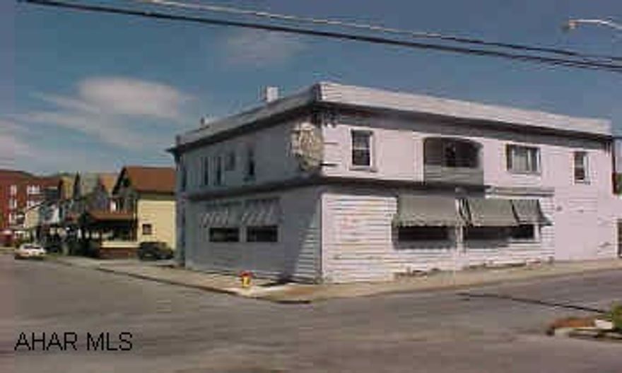 Owner wants an offer.  Two second floor apartments are remodeled.  One rents for $300 and other is $375, plus all utilities except water/sewer.  Bar/restaurant is vacant with some inventory.  Need variance.  City will work with us.