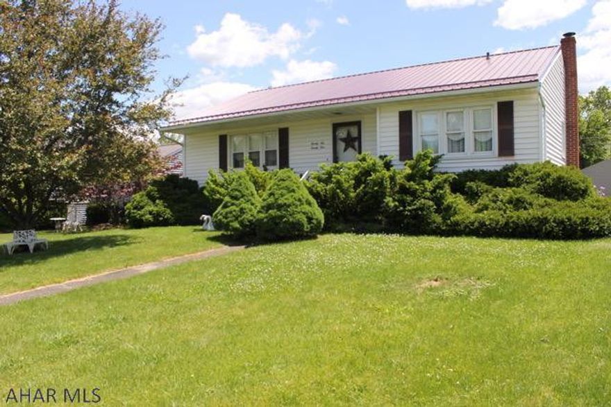 Adorable 2 bedroom 1.5 bath home centrally located to everything!  This home is well maintained with vinyl siding, metal roof, central air, 2 car detached garage and hardwood floors!!!  Off street parking makes this home easy to access.  Call to schedule your appointment today, homes are going fast!