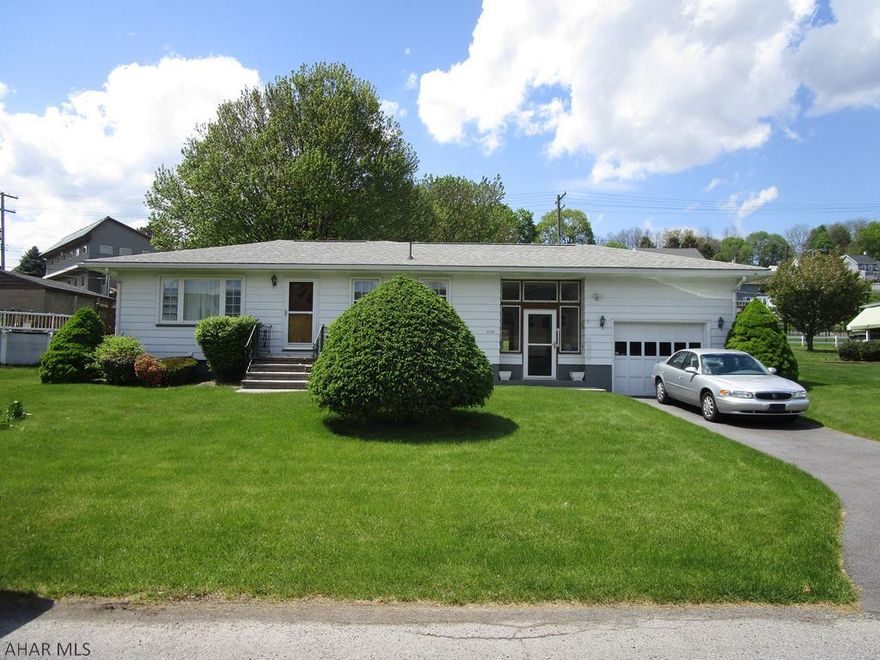 Attractive 2 bedroom rancher in Pleasant Valley. Oak kitchen, good sized living room, breezeway connecting garage, Large screened in rear patio.  Basement is mostly finished with half bath, summer kitchen and family room. 75x120 lot with blacktop drive. Great home for the $$.