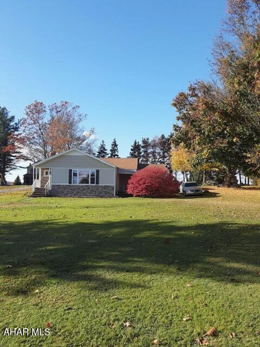 Vinyl sided rancher on approximately 0.6 acre lot. This home, in Chest Springs, features a nice kitchen, large living room, dining room, laundry, two bedrooms, 1.75 baths and a summer kitchen. Possible 3rd bedroom. Large mostly level lot across from the local ballfield.  Very nice house, no basement.