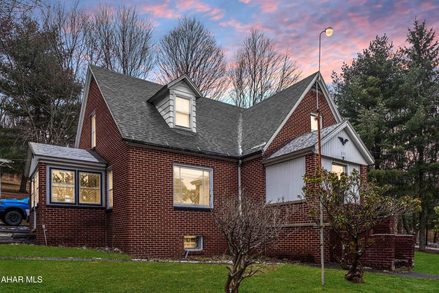 This is your opportunity to own a beautiful property between Carrolltown and Northern Cambria. This quaint cape cod style home sits on 2 acres and backs up against the forest. There are two garages with a total of 3 garage spaces plus two additional sheds. The home has a private brick patio, perfect for entertaining. Inside, you find more room that you might imagine! On the first floor, there's a nice sized kitchen and dining area plus a living room with a fireplace, two bedrooms and the full bath. Two more bedrooms are upstairs. The basement is partially finished with a small bath and laundry. Put your own finishing touches on it and make it your own! So much potential!