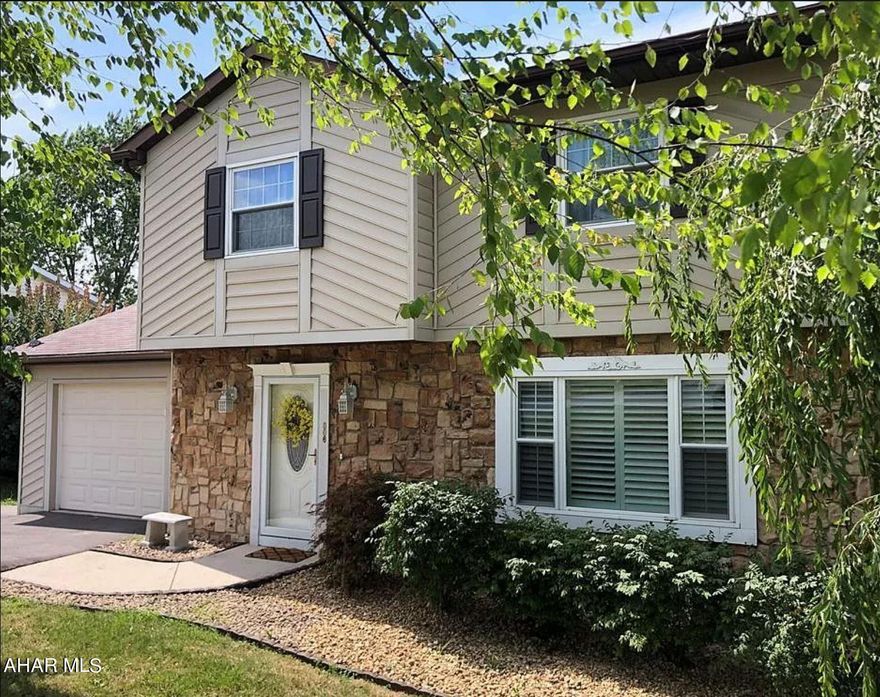 Don't miss this opportunity to reside in Penn Farms and Hollidaysburg school district!  You can move right into this lovely 4 bedroom home that is larger than it appears and has plenty of updates and features to excite.  

The main level has an open layout for the kitchen, living room and dining room areas, allowing for plenty of natural light and making it ideal for entertaining and accessibility.  Upon entering, you'll take in the fully renovated kitchen which is a chef's delight.  It features granite counters, slow-close cabinets and drawers, stainless appliances, back splash and light fixtures to accentuate the huge granite island.  The dining area provides access to the large covered deck with skylight, ideal for large cookouts or just relaxing in the shade. The living and dining areas have built in blinds.   The main level is completed with access to the finished basement, a mud room area with additional cabinets, updated powder room, and one of the garages. 
  
The second story has 4 bedrooms and 2 full baths.  The master bathroom is also fully remodeled and the walk-in closet has built ins for extra storage.  All bedrooms come have ceiling fan light fixtures.

The finished basement makes for a great family room or recreation area and boasts a gas fireplace with mantle.  Walk out to the concrete patio and fenced back yard.  The whole home has upgraded 200 amp electrical and there is an outside breaker box with a 220 volt connect that could be used to wire a hot-tub!  The backyard also has a shed with electric.  Off of the finished basement is a large utility room with laundry, storage and access to the second garage.  The second garage connects to the spacious, flat, back driveway area.