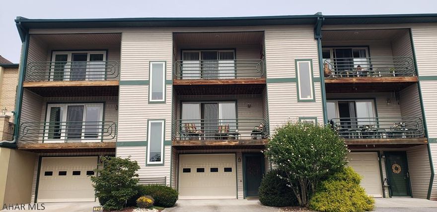 Breathtaking views at this exclusive 2 bedroom 3 bath condo at Canoe Creek State Park. The garage level features a charming entry way with cork flooring and access to the garage, and laundry. On the main floor, you will find an open living room, beautiful sliding door leading to the balcony, a half bath, eat in kitchen with granite counter tops, large walk in pantry and a dining area. Sliding glass doors open onto a private fenced patio with beautiful landscaping and parking. On the second floor, the master bedroom has a PRIVATE balcony with stunning views full bathroom and large WIC CLOSET. The 2nd spacious bedroom overlooks the rear patio. There is also a full main bathroom and laundry hookups on the 2nd floor.  This home is worth a look to appreciate all it offers. Call today!