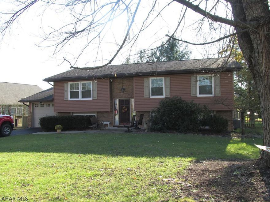 Nothing to do but "move in" to this immaculate split entry in Oldtown Village and make it your own - walk to Frankstown Elementary School.  Enjoy the multi level deck overlooking a pristine level lot complete with a 10x13 shed.  This well cared for home has lots of entertaining space - FR w/woodburning FP, DR has sliding door to covered deck.  New windows & siding, roof 30 yr shingle (10 yrs), new 500 gal buried oil tank, new well tank.  1 car attached garage.  Don't wait - owner says sell!!  Perfect family home!