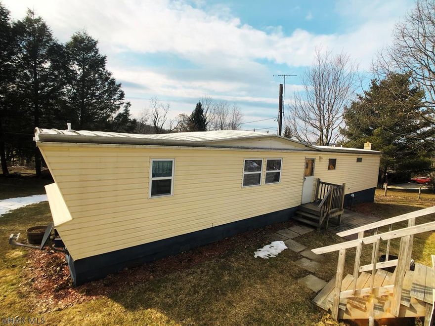 Affordable 2 bedroom ranch in Conemaugh Valley School District. Enjoy 1-floor living on .46 acres! Eat-in kitchen has vinyl flooring and opens to living room with gas fireplace. Newer windows in kitchen and living room. Laundry hook-ups in mud room and basement! Bonus room in basement could be used as a 3rd bedroom! All appliances included! Newer Furnace (2014). Gas fireplace in living room and Pellet Stove in basement, both great for supplemental heating. Relax on the rear deck under the pergola! Excellent starter home, affordable taxes!