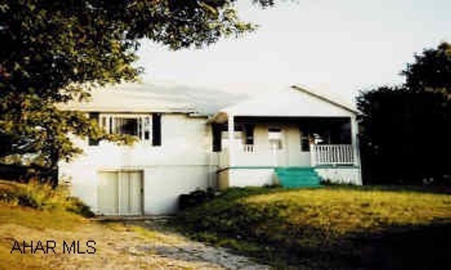 1 1/2 story frame house on .373 acres, road frontage.