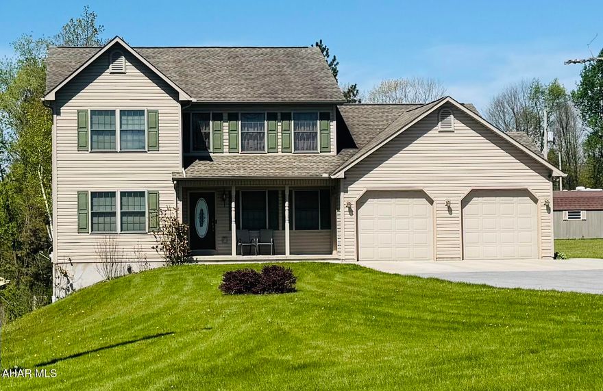 Situated on 1.1 acres, this spacious 5- bedroom, 4-bath home offers comfort, functionality, and room to entertain both inside and out. The inviting open floor plan features a large living room with an electric fireplace, flowing seamlessly into the formal dining room highlighted by oversized windows that fill the space with natural sunlight. The well-appointed kitchen comes complete with all appliances included, while the convenient first-floor laundry adds everyday ease. The first-floor primary suite offers a private retreat with a large bath featuring a soaking tub. A lower- level bedroom with a 3/4 bath provides excellent space for guests or extended family. The finished lower level also includes a second large entertainment room, perfect foe gatherings, recreation, or a media area. Outdoor living is exceptional with a two-tier deck, including an upper 12x32 deck and a lower 16x24 deck overlooking the property. Additional features include central air conditioning and an efficient heat pump heating system with electric strip backup. Furniture is negotiable, making this home move-in ready with flexible options for the new owner.