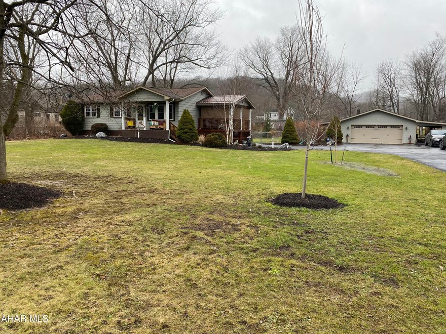 Move-in ready, one story living! Immaculate 3 bedroom, 1 full bath home that has been updated throughout. Stylish laminate flooring and modern kitchen with SS appliances. Private back yard, fully fenced in. Garage will hold 6 cars and attached carport to hold an additional 3 cars length wise. Two spaces to sit back and relax...the entry porch or the covered patio next to the garage.