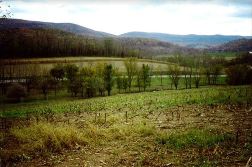 Ideal building lot for a year round home or weekend getaway. Situated between Cumberland and Bedford. Wooded, partially cleared, fabulous view with stream running through the back of the property.