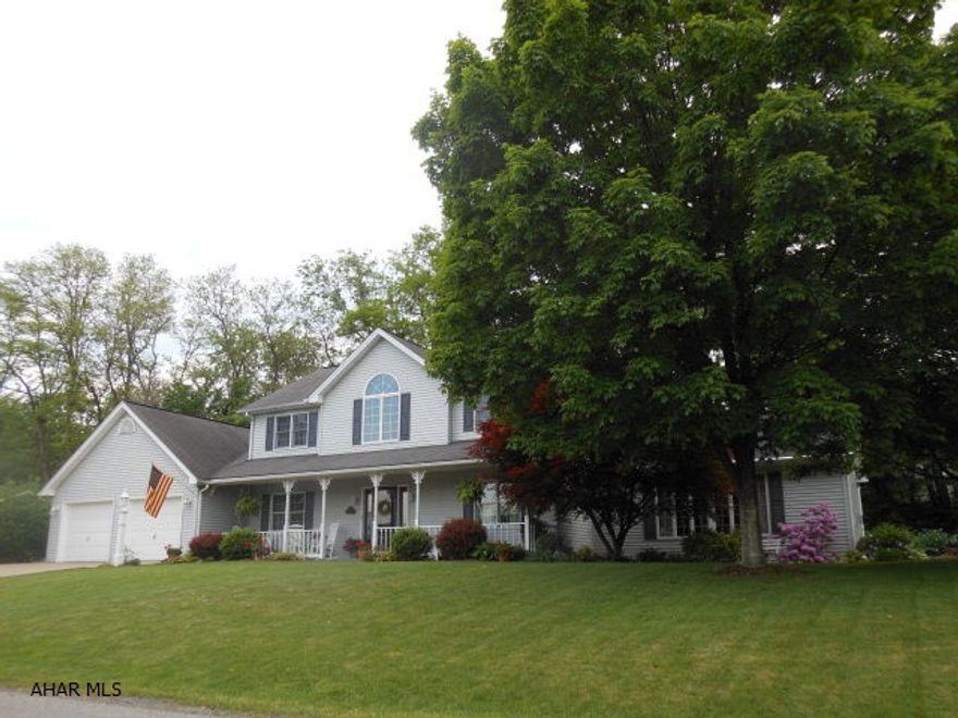 Space and Charm..Charm and Space !! This wonderfully planned home is perfect for entertaining and relaxing. Main level features living room, dining room, terrific kitchen w/ wet bar & pantry cabinet plus an amazing eating area w/ brick fireplace that opens to huge Great room w/cathedral ceilings, built -in bookcases & stone fireplace.. all of these leading out to the quiet patio & covered porch.First floor laundry & 1/2 bath make everyday living very convenient. Large Master Suite and bath for total privacy. Rec Room, exercise room & 1/2 on lower level are wonderful finished spaces w/ possibility of 4BR plus great workshop/storage space. Hardwood floors through out most of the first floor, solid wood doors and a brand new furnace are just a few of the many amenities in this wonderful home.