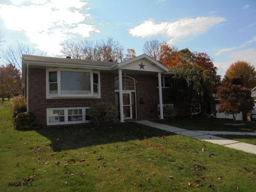 Ebensburg-  3 BR, 2 1/2 bath raised ranch brick  home with 2 car attached garage. Fabulous open concept kitchen / Dining room with a bar area. Finished basement with wet bar/ office or 4th BR possibility!