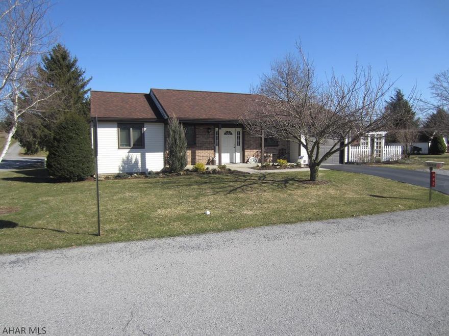 A very nice, well kept ranch house with 2 BR and 1.5 BA.  Located near Hoover  Drive, this home sets on a .14 acre lot but also has another .14 acre lot, deeded separately, included  with the sale.  It's in a nice neighborhood, at the edge of town and if you want to downsize or just need a nice starter home, this is one you should take a look at.  It has a nice 1 car attached garage, covered porch and wood deck, all on a nice level corner lot.