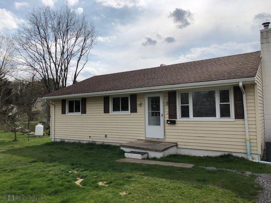 Beautiful 3 bedroom ranch home  hardwood floors throughout. Lovely kitchen complete with appliances. The house sits among fruit trees and a stocked creek. Great wood stove keeps home nice and warm in winter.