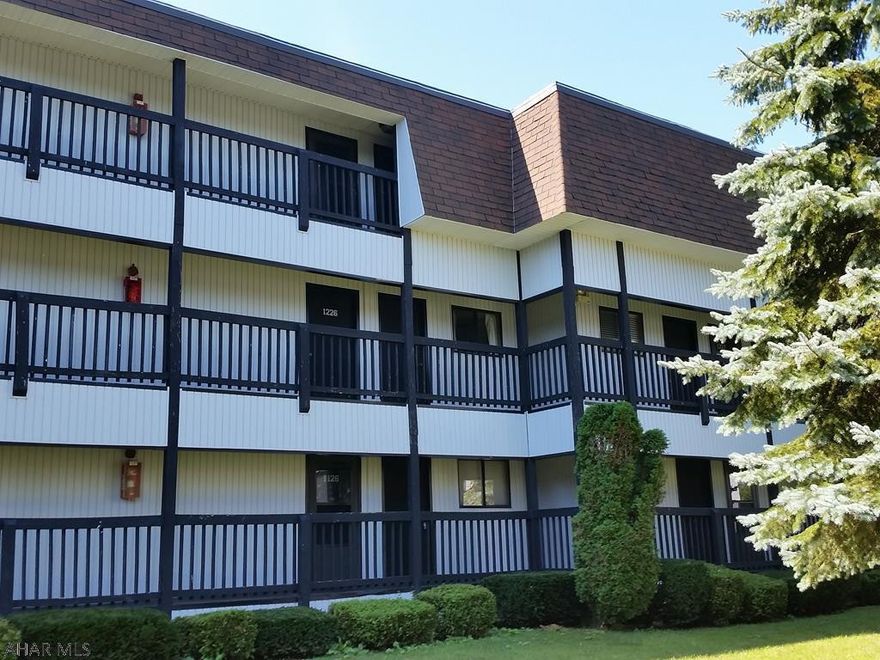 First-floor immaculate 2 bedroom, 2 bath condo with view of woods from back balcony, located across from hot tub building.  Fully furnished.   Condo is tastefully decorated & includes new flat screen tv.  Enjoy the amenities of this 4 season resort:  skiing, swimming, tennis and golf.  $256.00 monthly association fee includes outside maintenance, road maintenance, tennis, hottubs, indoor and outdoor pools & trash removal. Sq ft per tax card - buyer to verify sq ft & taxes. J-481