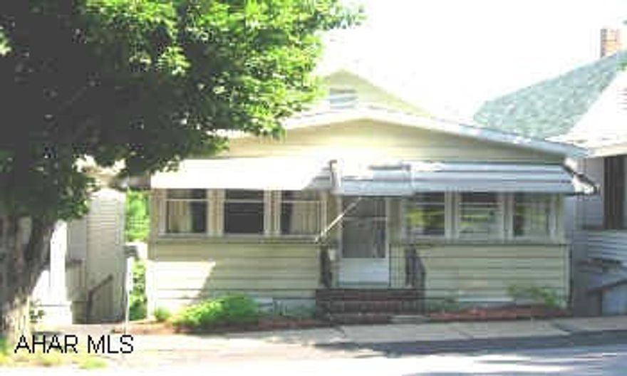 NEW ROOF IN 2005. NEWER HOT WATER TANK. EAT IN KITCHEN W/ RANGE, REFRIGERATOR, DISHWASHER. ROLL OUT SHELVES IN KITCHEN CABINETS. ENCLOSED HEATED FRONT PORCH. PULL DOWN STEPS FOR ATTIC STORAGE. NEW ELECTRIC SERVICE. GREAT AREA NEAR BAKER SCHOOL.