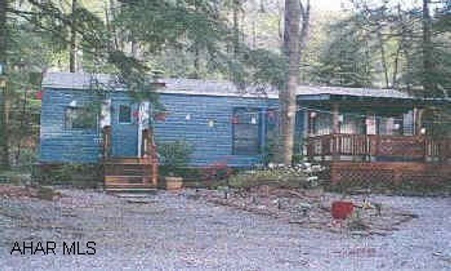 2 separate units. (camper & bunk house) Exceptional unit- very clean lot. includes use of all amenities.