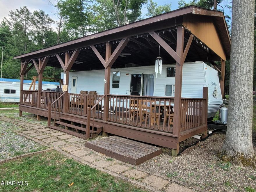 If you are looking for space both inside and out for your camping adventures, come take a look.  Two bedrooms offers sleeping in beds for six.  Large covered deck for cooking and eating outside, rain or shine.  Over 1/3 acres of wooded ground for you all to enjoy the outdoors.  Located in Glendale Yearound, a gated recreational community adjacent to Prince Gallitzin State Park / Glendale Lake.