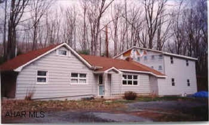 NICE PROPERTY, OVER 2 ACRES, THERE IS AN ADDITION TO THE ORIGINAL HOUSE WHICH CONSISTS OF MASTER BEDROOM, 1.5 BATH, LAUNDRY AND 3 BEDROOMS.  IT NEEDS TO BE FINISHED.