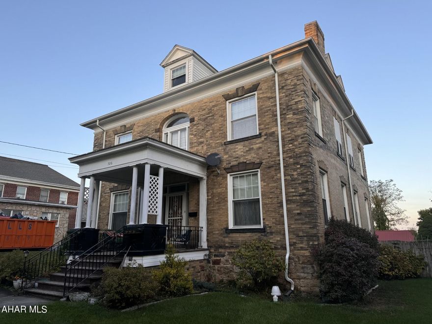 This is a one of a kind Ebensburg home featuring stained glass window in the stairway landing, stained glass foyer area, several fireplaces and pocket doors.  Spacious 4 bedrooms with built-ins.  Finished basement with family room, bath & kitchenette.  Gas HW radiator heat.  Carport at the rear of the yard area.