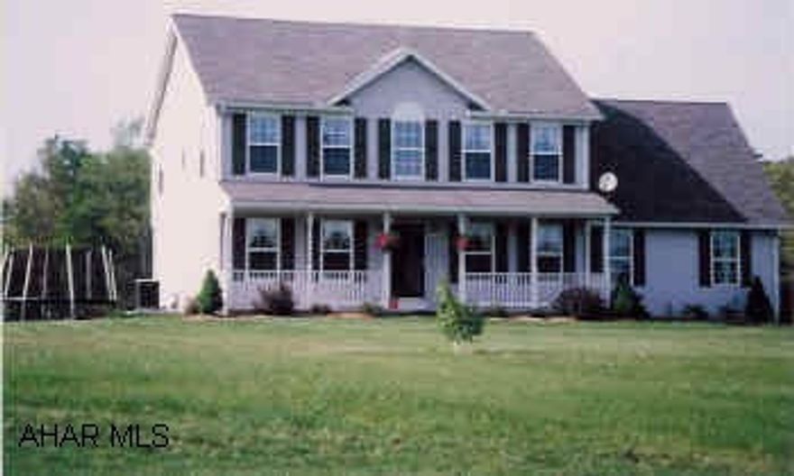 2 Story vinyl. Features 4 bedrooms, 2 full 1 half bath, modern kitchen with work island. Attached 2-car garage. Stream, Home Warranty.