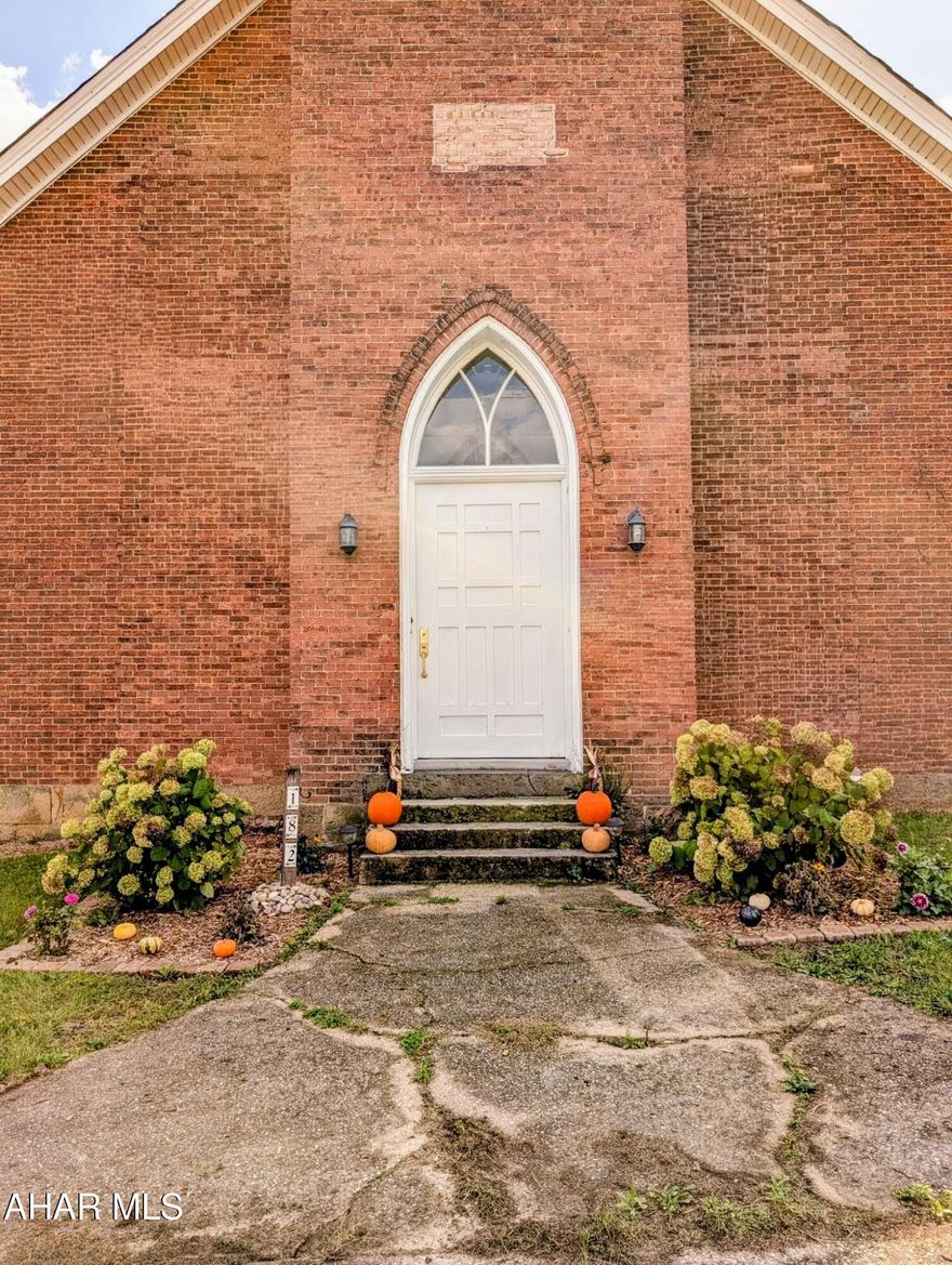 You won't want to miss this stunning church-to-home transformation-truly one of a kind property that combines character, charm, and modern luxury. Step inside to a spacious open floor plan featuring a welcoming foyer with a grand arched doorway that leads into a beautiful main livingroom and a great room, anchored by a striking 15-ft sandstone firepace. The chef's kitchen is designed to impress with a large center island, granite countertops, a Sub-Zero refrigerator, and a Wolf range-Perfect for entertaining. The main floor features the primary bedroom suite, complete with a spa like ensuite bath offering a steam shower and jacuzzi tub. Upstairs, you'll find a loft overlooking the main living area, a full bath, and a spacious second bedroom . Unique to this home is access to the bell tower on the second floor. A charming reminder of its historic roots. The lower level includes a large rec room (or optional bedroom), laundry room, and half bath. Outside, enjoy the large patio-ideal for gatherings. A detached garage with a finished loft that offers extra living or workspace. Additional features include radiant floor heating .